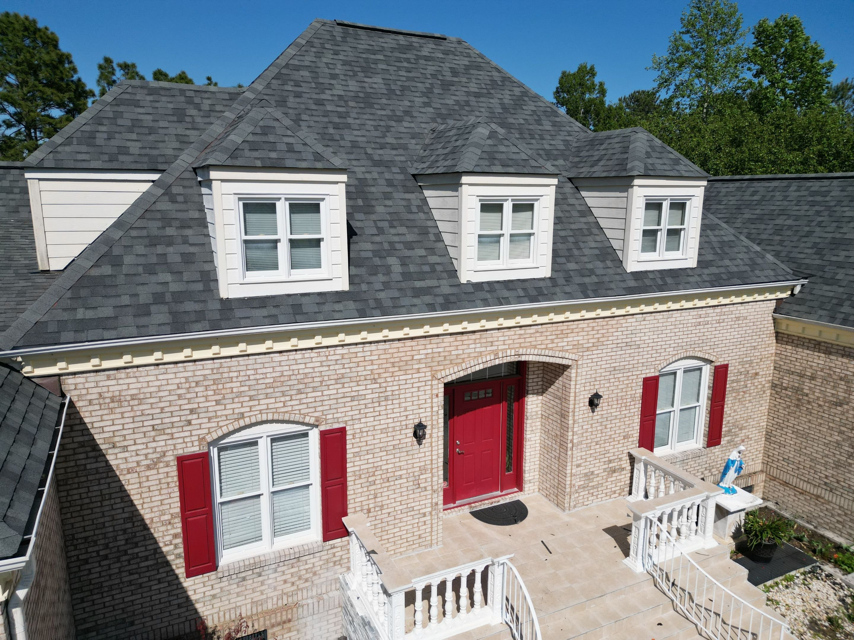 tan-home-light-gray-shingle-roof-front